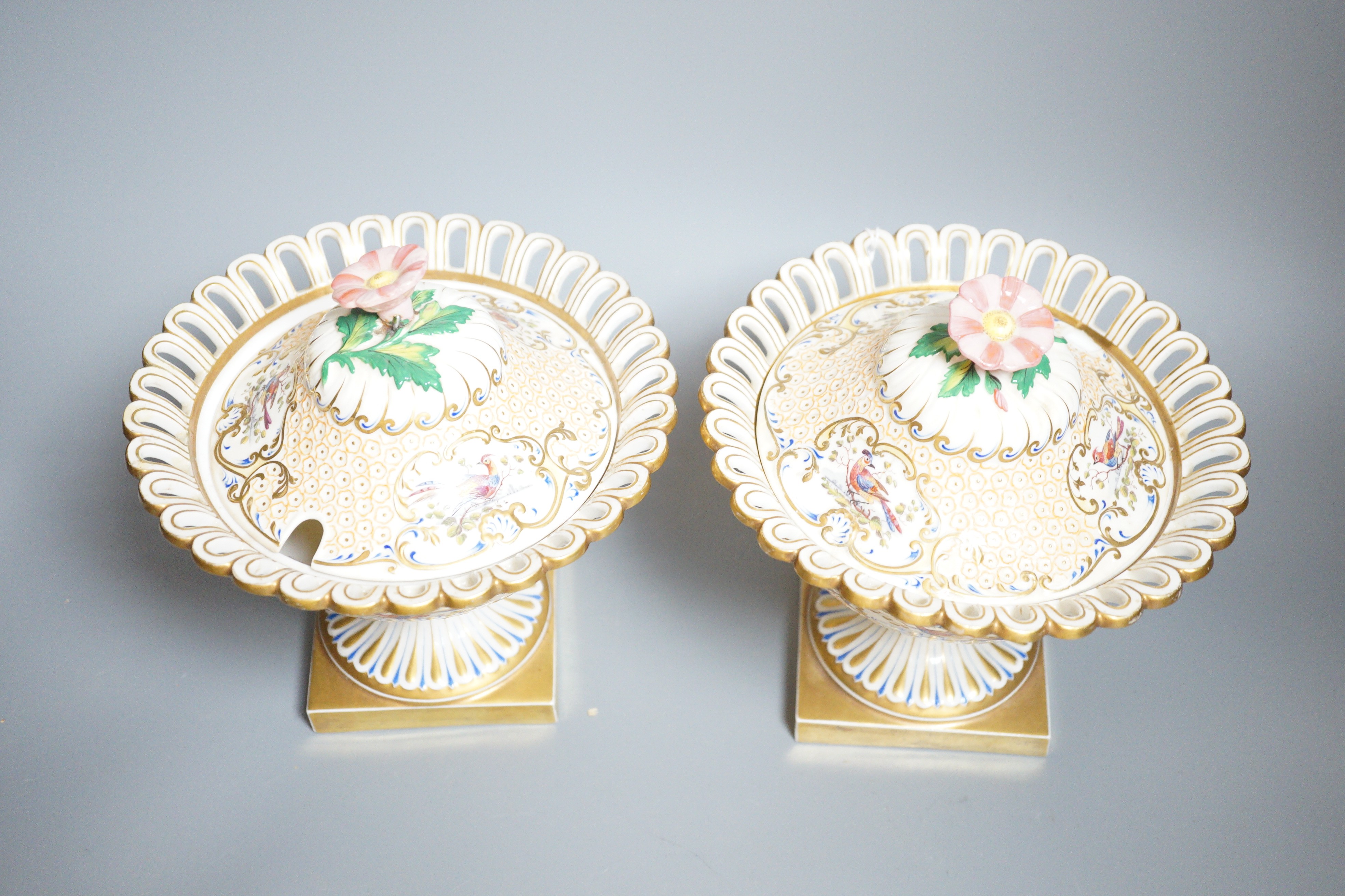 A pair of 19th century continental porcelain tazzas together with a smaller example and planter (4), tallest 19cm